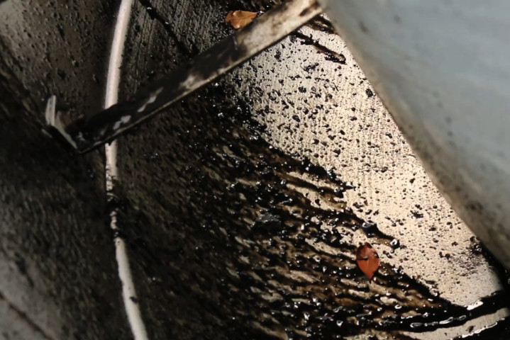 Grease containment inspection and service